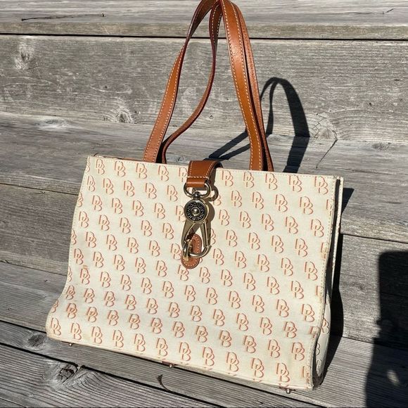 Dooney & Bourke ivory and brown monogram tote purse - Picture 1 of 11